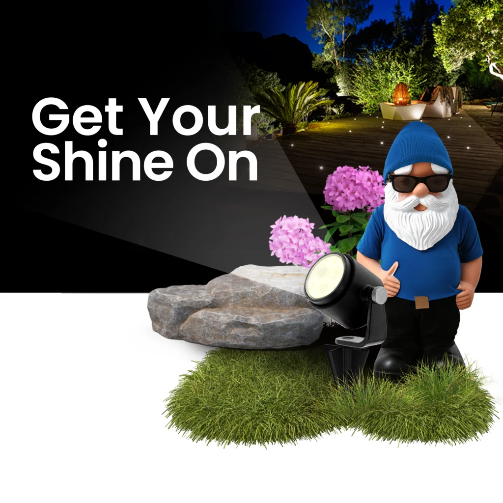 Digital Marketing Ad for Landscape Lighting with grass, rocks, plants, a gnome. The typography says Get Your Shine On